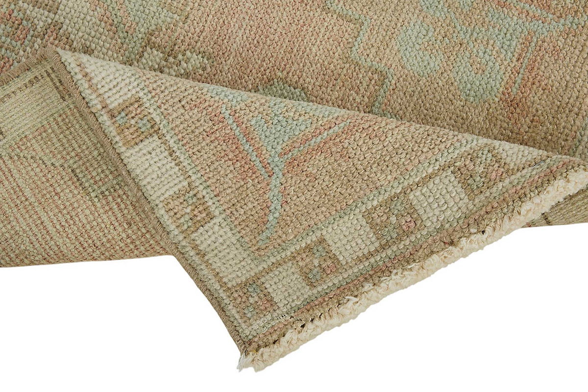 Vayla Bej Pembe Madalyon Desenli Etnik El Dokuma Halı 50x106 cm – kenar detayı