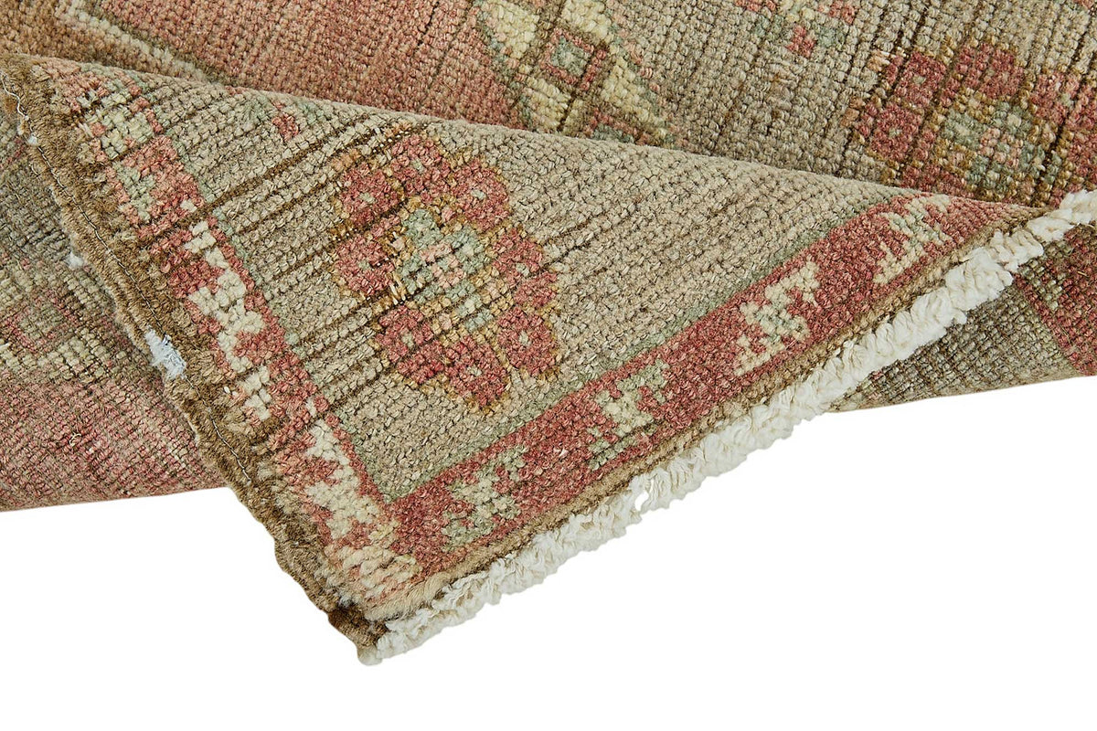 Vayla Pembe Bej Geometrik Etnik El Dokuma Halı 45x91 cm – kenar detayı