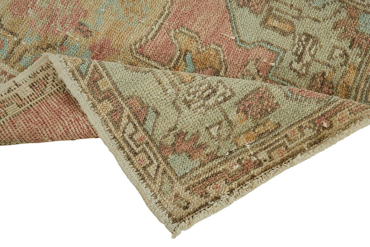 Vayla Pembe Bej Madalyon Desenli Vintage El Dokuma Halı 56x102 cm – kenar detayı