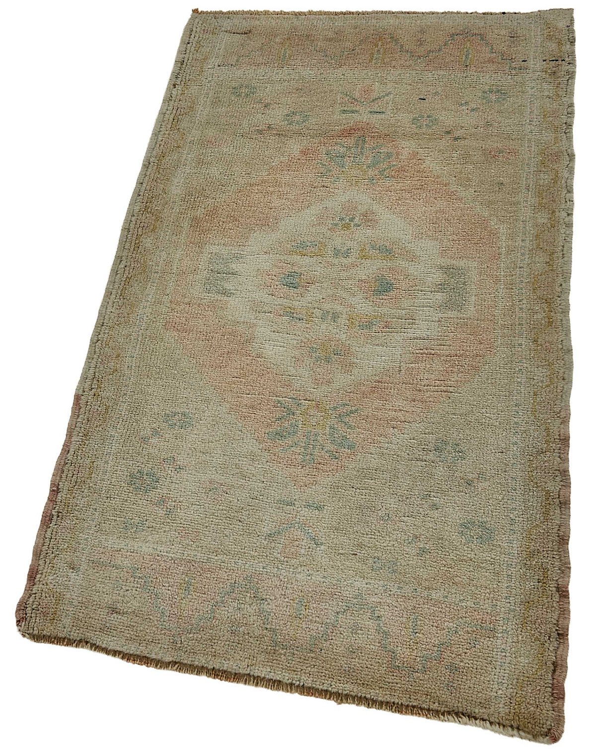 Vayla Bej Pembe Madalyon Desenli Vintage El Dokuma Halı 57x115 cm – doku yakın çekim