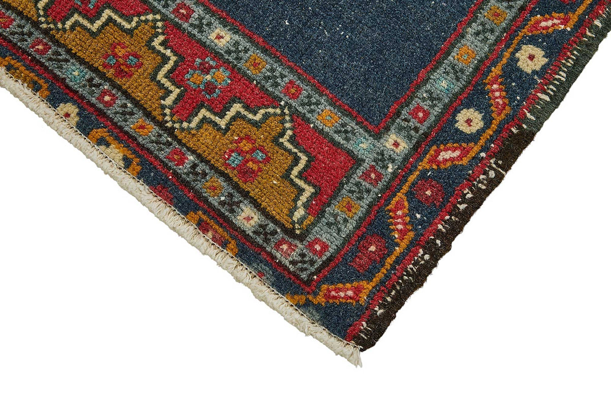 Vayla Lacivert ve Kırmızı Geometrik Desenli Dokuma Halı 50x96 cm – detay görünümü