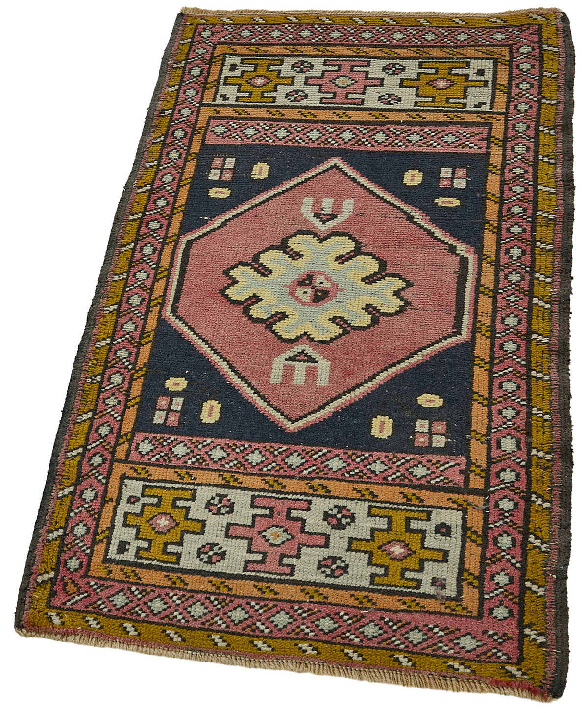 Vayla Lacivert Pembe Madalyon Desenli El Dokuma Halı 54x100 cm – doku yakın çekim