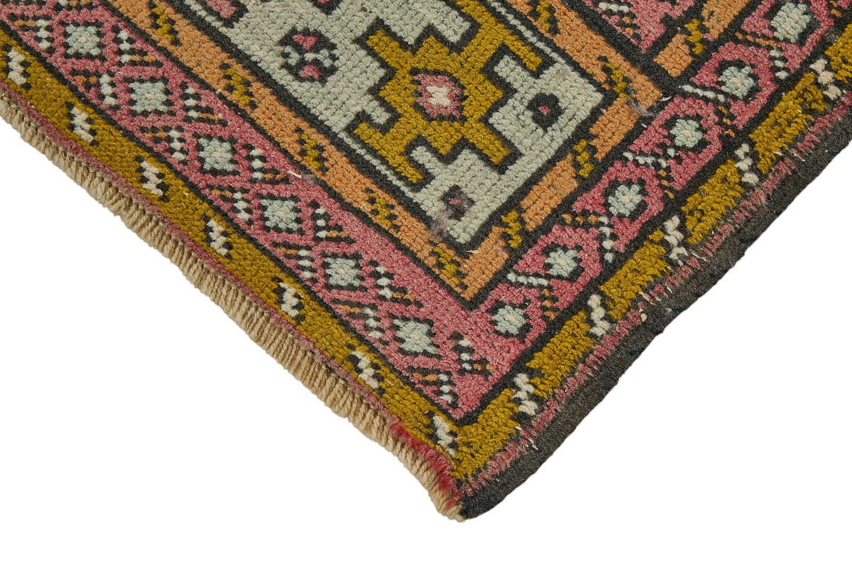 Vayla Lacivert Pembe Madalyon Desenli El Dokuma Halı 54x100 cm – detay görünümü
