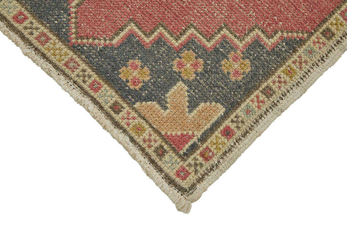 Vayla Pembe Lacivert Etnik Geometrik Desenli El Dokuma Halı 53x99 cm – detay görünümü