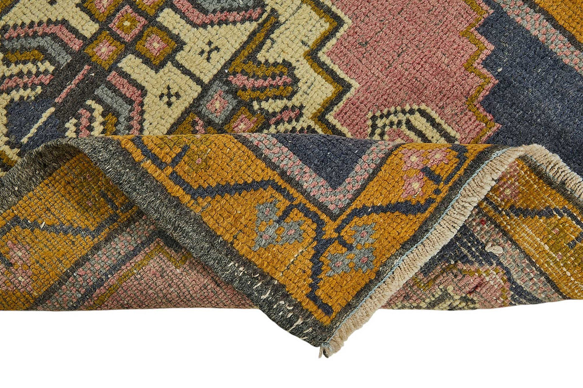 Vayla Lacivert Gümüş Madalyon Desenli Geometrik El Dokuma Halı 57x89 cm – kenar detayı