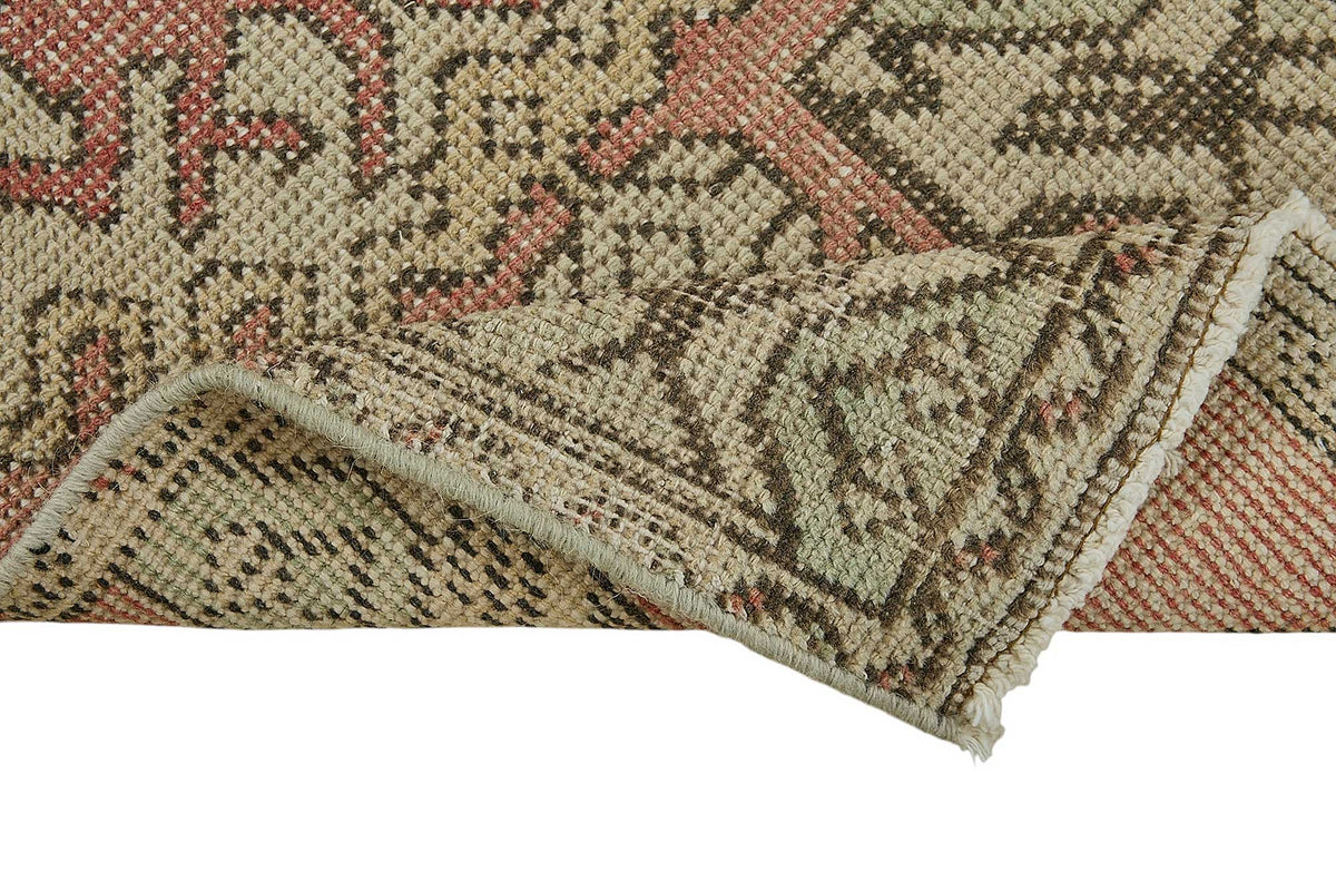 Vayla Soluk Pembe Madalyon Desenli Yün El Dokuma Halı 48x94 cm – kenar detayı