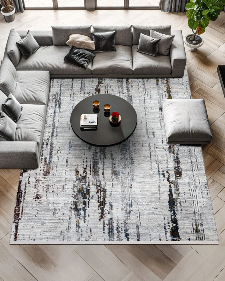 Abstract Charcoal and Brown Low Pile Area Rug – in the living room