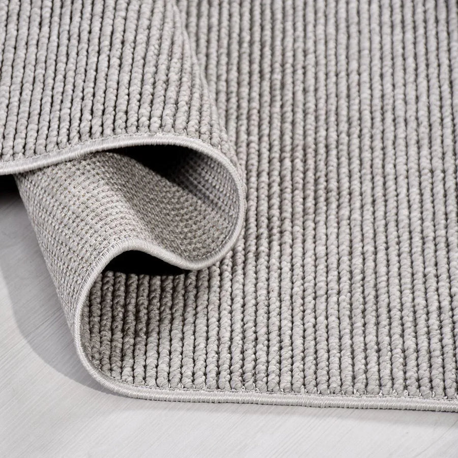 Modern Light Grey Area Rug with Textured Stripes – in the hallway