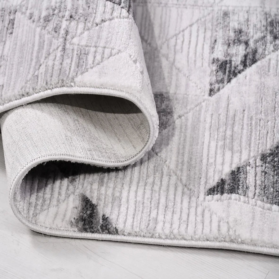 Modern Geometric Non-Slip Area Rug in Grey & White – in the living room