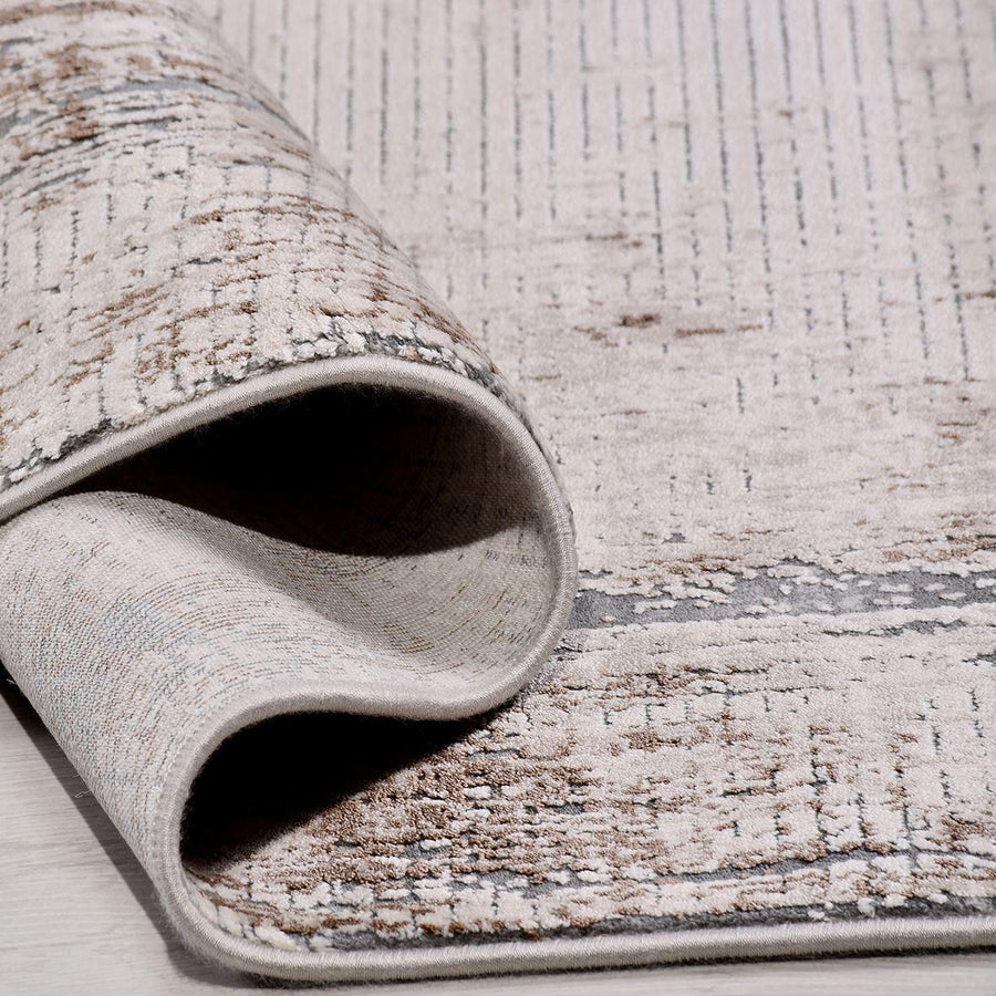 Cream and Grey Abstract Area Rug with Distressed Look – in the hallway