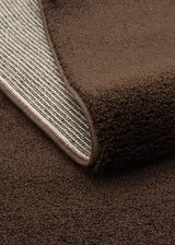 Zuvra Brown Solid Modern Round Machine-Made Rug