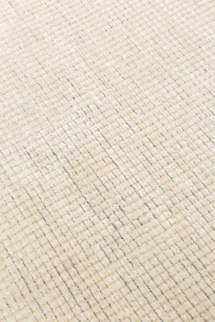 Varni Bej Düz Renk Yıkanabilir Modern Yuvarlak Kilim – doku yakın çekim
