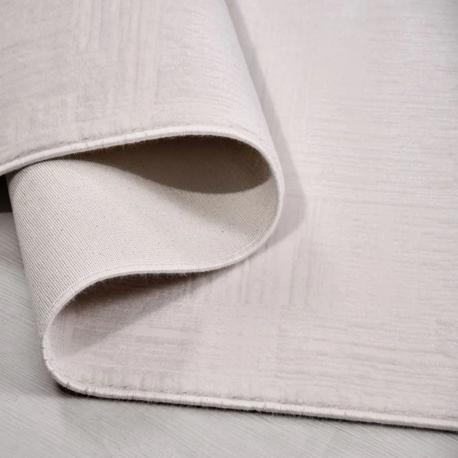 Moderner Teppich in Creme & Grün mit Reliefstruktur – andere Ansicht