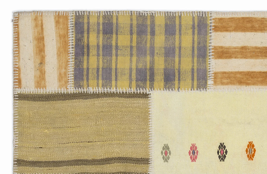 Cream Patchwork Hand-Woven Wool Rug 120x180 cm (3'11" x 5'11") – in the hallway