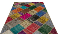 Bunter handgeknüpfter Wollteppich mit geometrischem Muster 163x231 cm