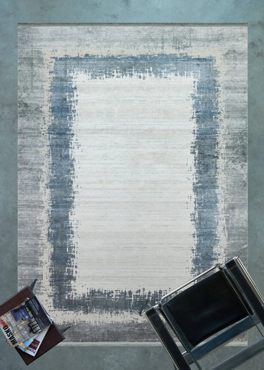 Modern Abstract Area Rug in Grey and Blue – in the living room
