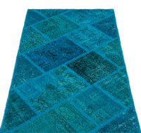 Geometrischer Teppich Türkis aus Wolle & Baumwolle 80x150 cm