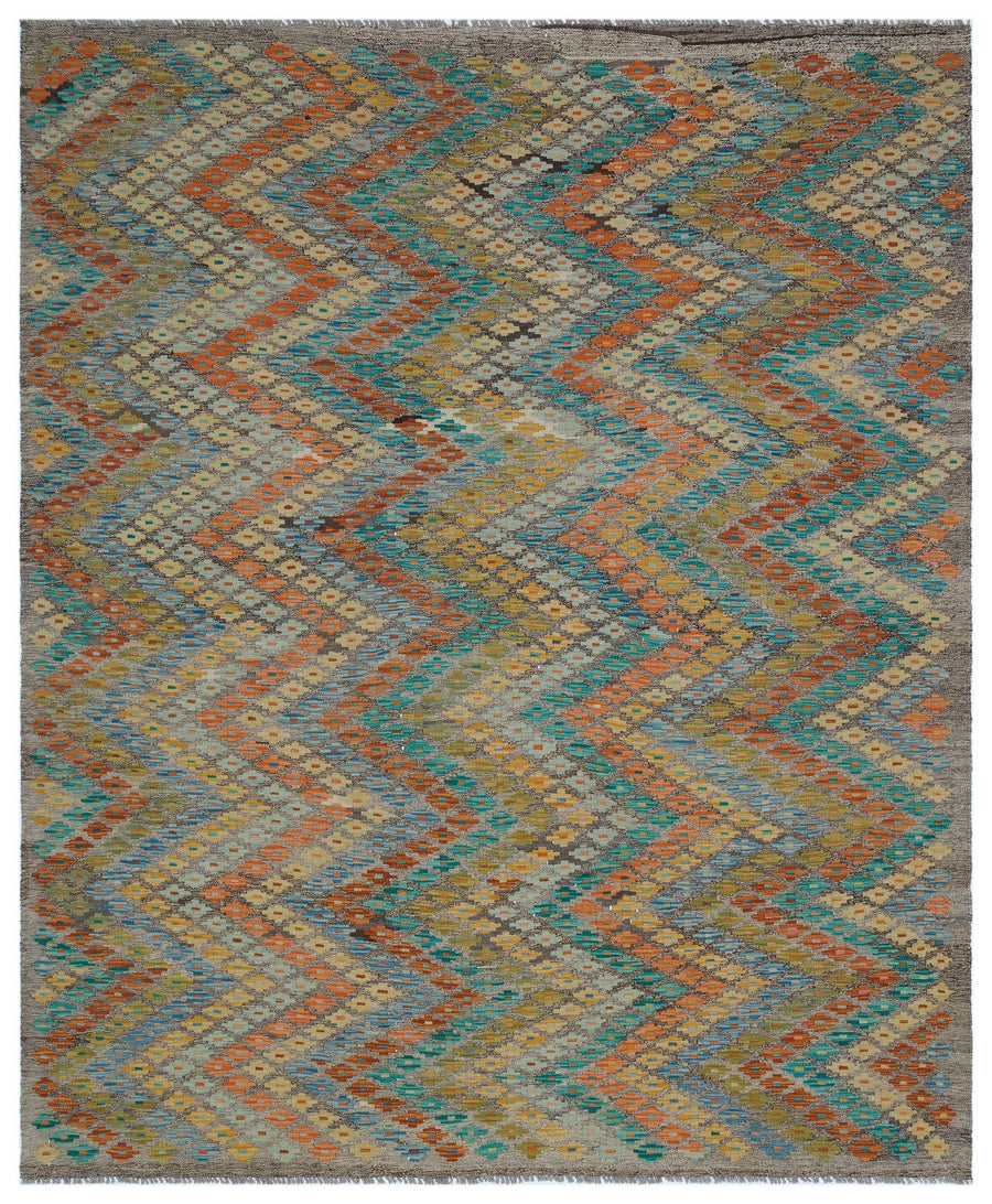 Grauer Wollteppich mit türkisem Ethno-Muster 202x245 cm – im Wohnzimmer