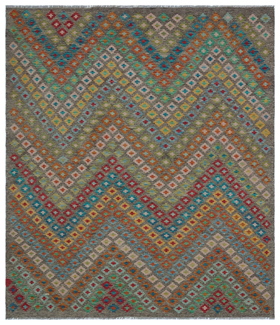 Grauer handgeknüpfter Wollteppich mit Ethno-Muster 209x242 cm – im Wohnzimmer