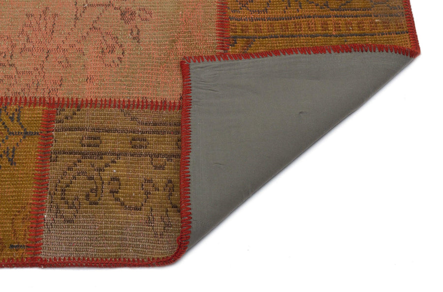 Brown and Red Patchwork Hand-Woven Wool Rug 120x181 cm (3'11" x 5'11") – in the living room