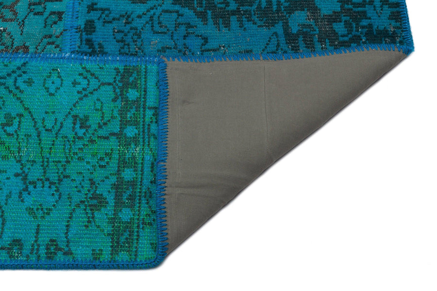 Vintage Patchwork Teppich in Türkis und Blau 160x230 cm – im Wohnzimmer