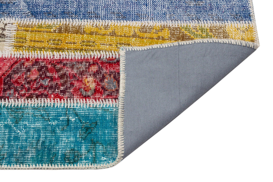 Bohemian Patchwork Hand-Knotted Wool Rug 150x235 cm (4'11" x 7'9") – in the living room