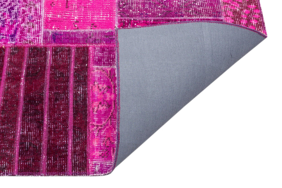 Geometric Pink and Purple Vintage Wool Rug 159x227 cm (5'3" x 7'5") – in the hallway