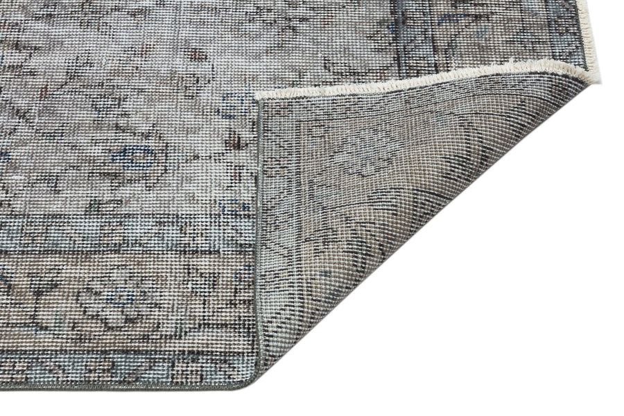 Grauer Wollteppich mit floralem Muster in Anthrazit 159x260 cm – im Wohnzimmer