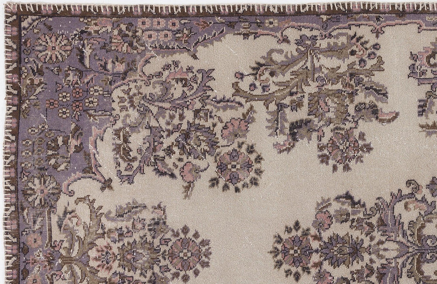 Beige Floral Hand-Knotted Wool Rug with Purple Accents 170x290 cm – in the living room
