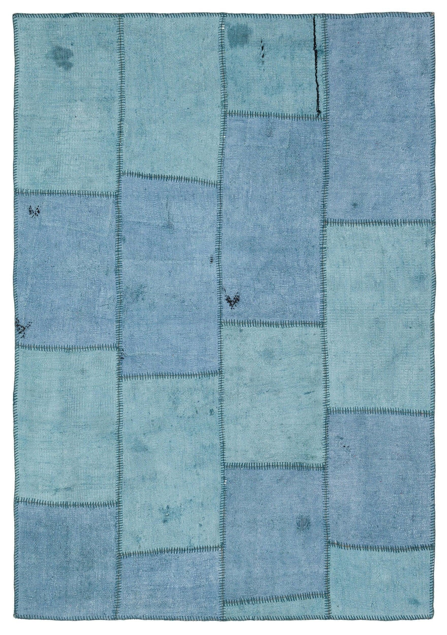 Blue Geometric Patchwork Style Wool Rug 155x223 cm (5'1" x 7'4") – in the hallway