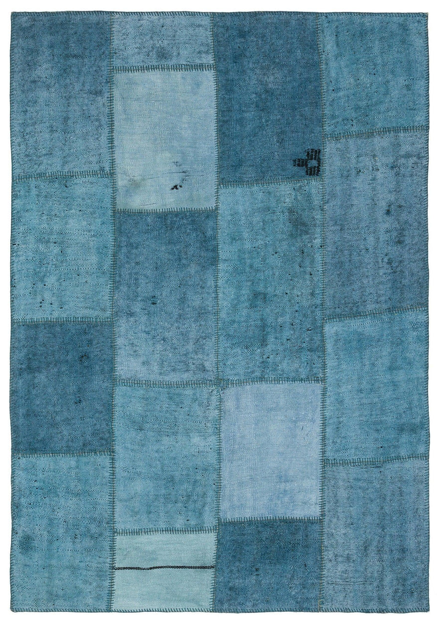Blue Geometric Patchwork Rug in Handwoven Wool 156x225 cm (5'1" x 7'5") – in the living room