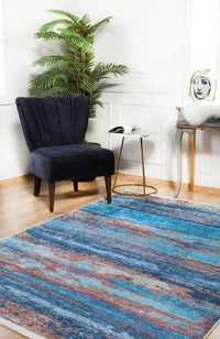 Moderner abstrakter Teppich in Blau und Braun