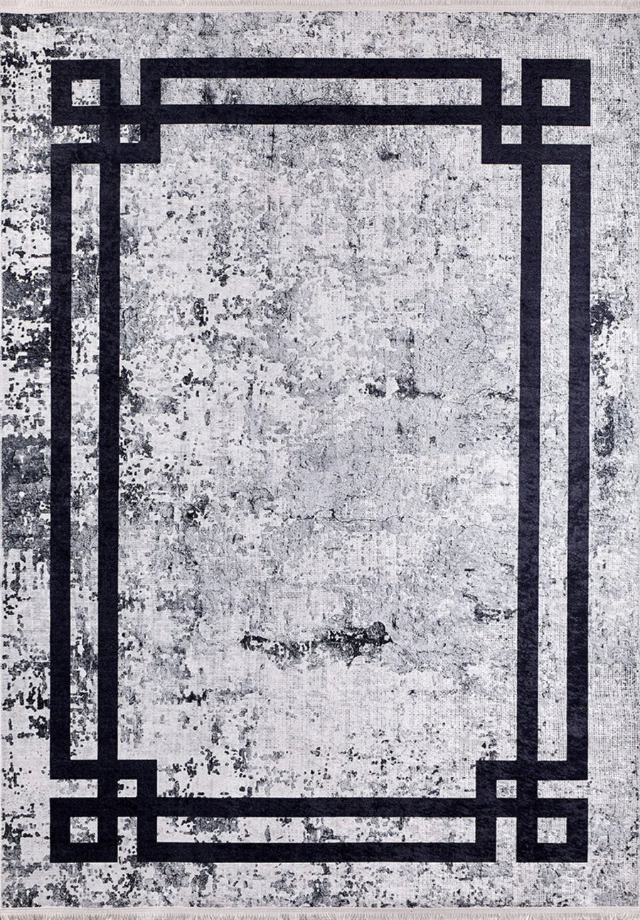 Grey and Black Geometric Area Rug with Modern Design – in the living room