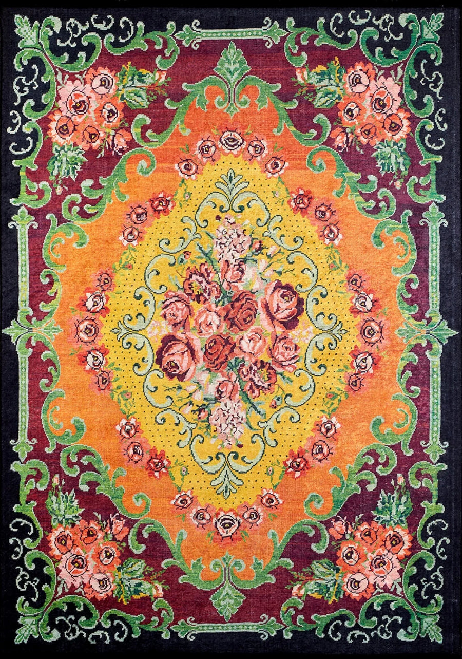 Orange & Burgundy Floral Area Rug with Border – in the living room