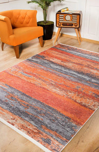 Moderner Teppich mit abstraktem Muster in Orange & Grau
