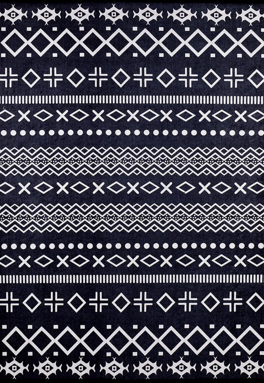 Black and White Ethnic Geometric Area Rug – in the living room