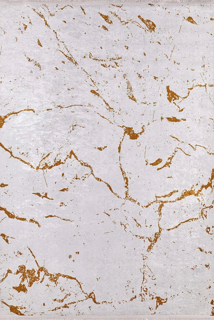 White and Gold Abstract Area Rug – in the living room