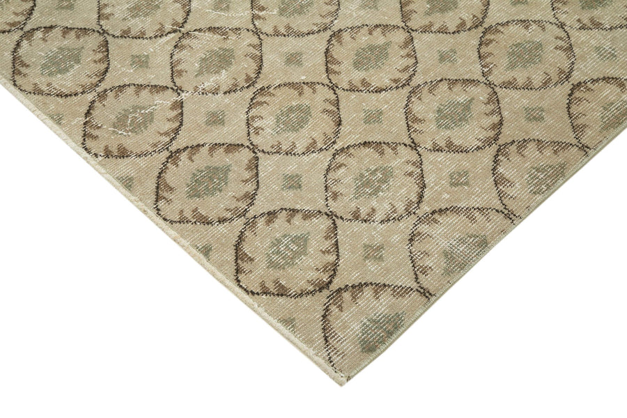 Beiger Vintage Teppich mit geometrischem Muster 170x273 cm – im Wohnzimmer