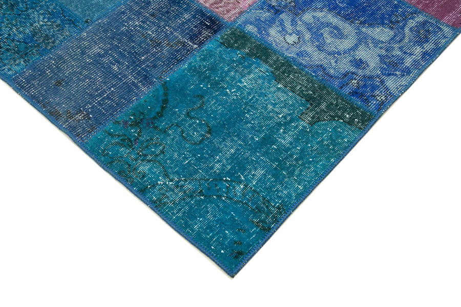 Blue & Turquoise Geometric Wool Patchwork Rug 202x300 cm (6'8" x 9'10") – in the living room