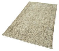 Beiger Vintage Teppich Overdyed mit Blumenmuster 112x209 cm