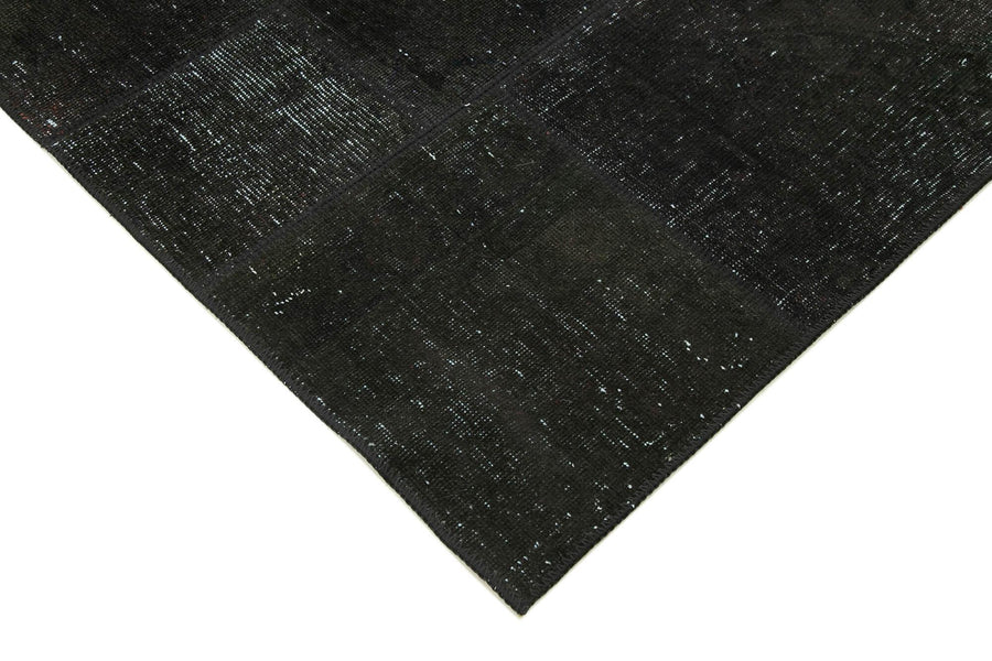 Anthracite Gray & Black Geometric Wool Patchwork Rug 172x241 cm (5'8" x 7'11") – in the living room