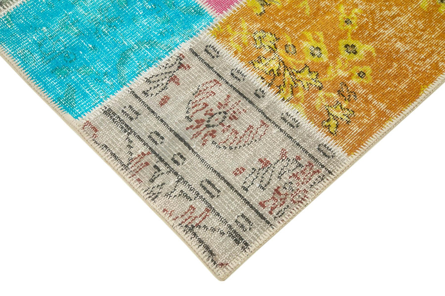 Türkiser Vintage Patchwork Teppich aus Wolle 143x206 cm – im Wohnzimmer