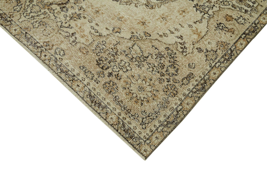 Beiger Vintage Orientteppich mit Medaillon 164x265 cm – im Wohnzimmer