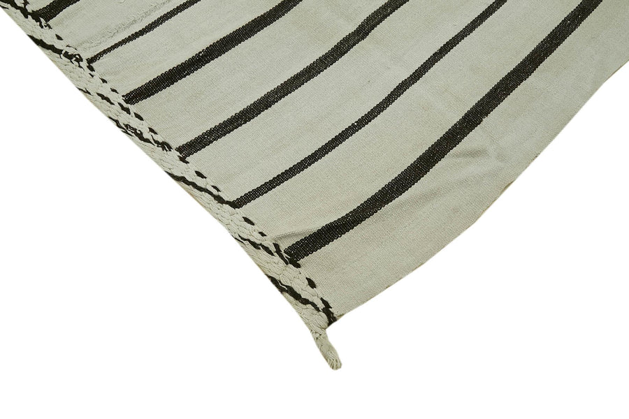 Striped Ecru and Black Hand-Woven Hemp Area Rug 200x247 cm (6'7" x 8'1") – in the living room