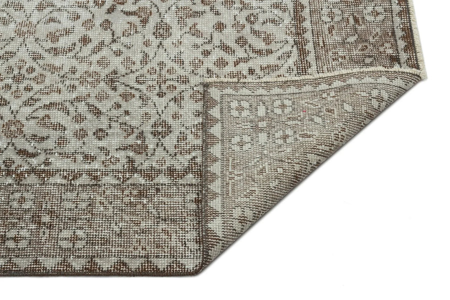 Beiger Wollteppich mit floralem Muster, handgeknüpft 168x274 cm – im Wohnzimmer