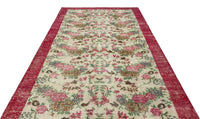Cremefarbener Wollteppich mit rosa Blumenmuster 189x313 cm